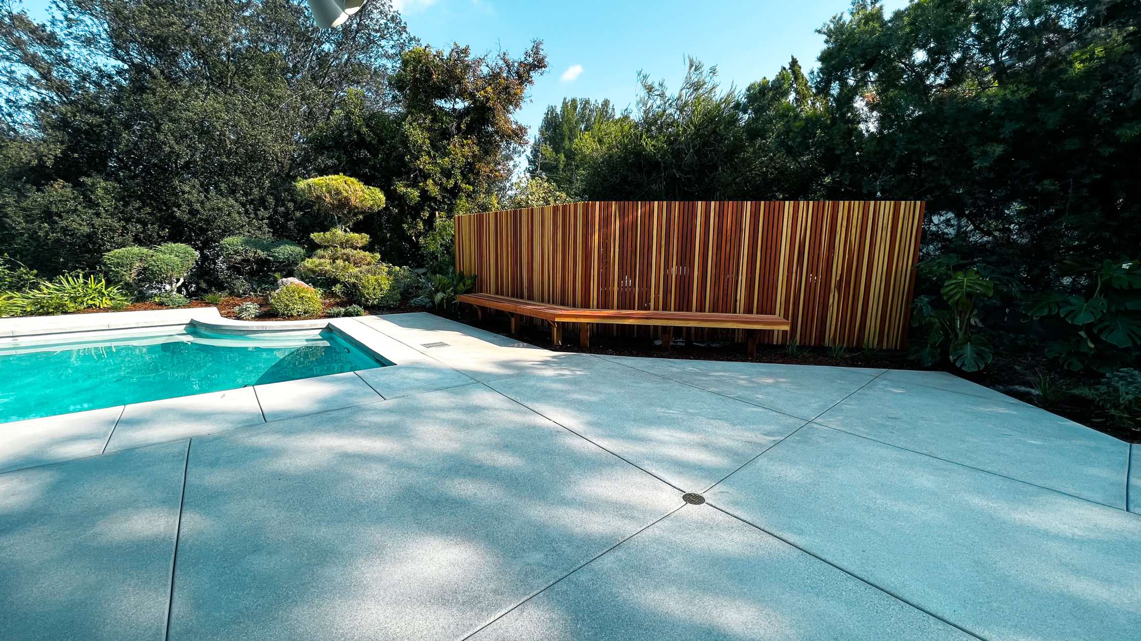 Poolside landscape construction